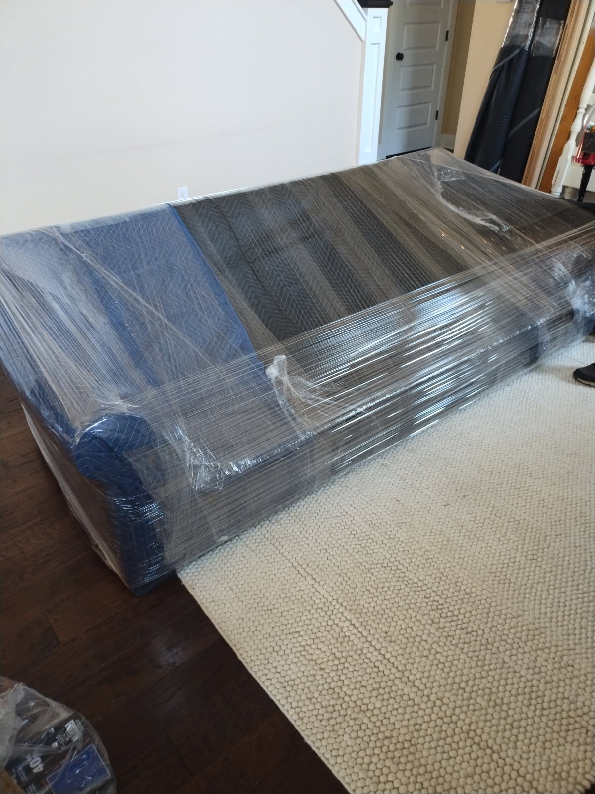 Sofa wrapped and ready for safe transport
