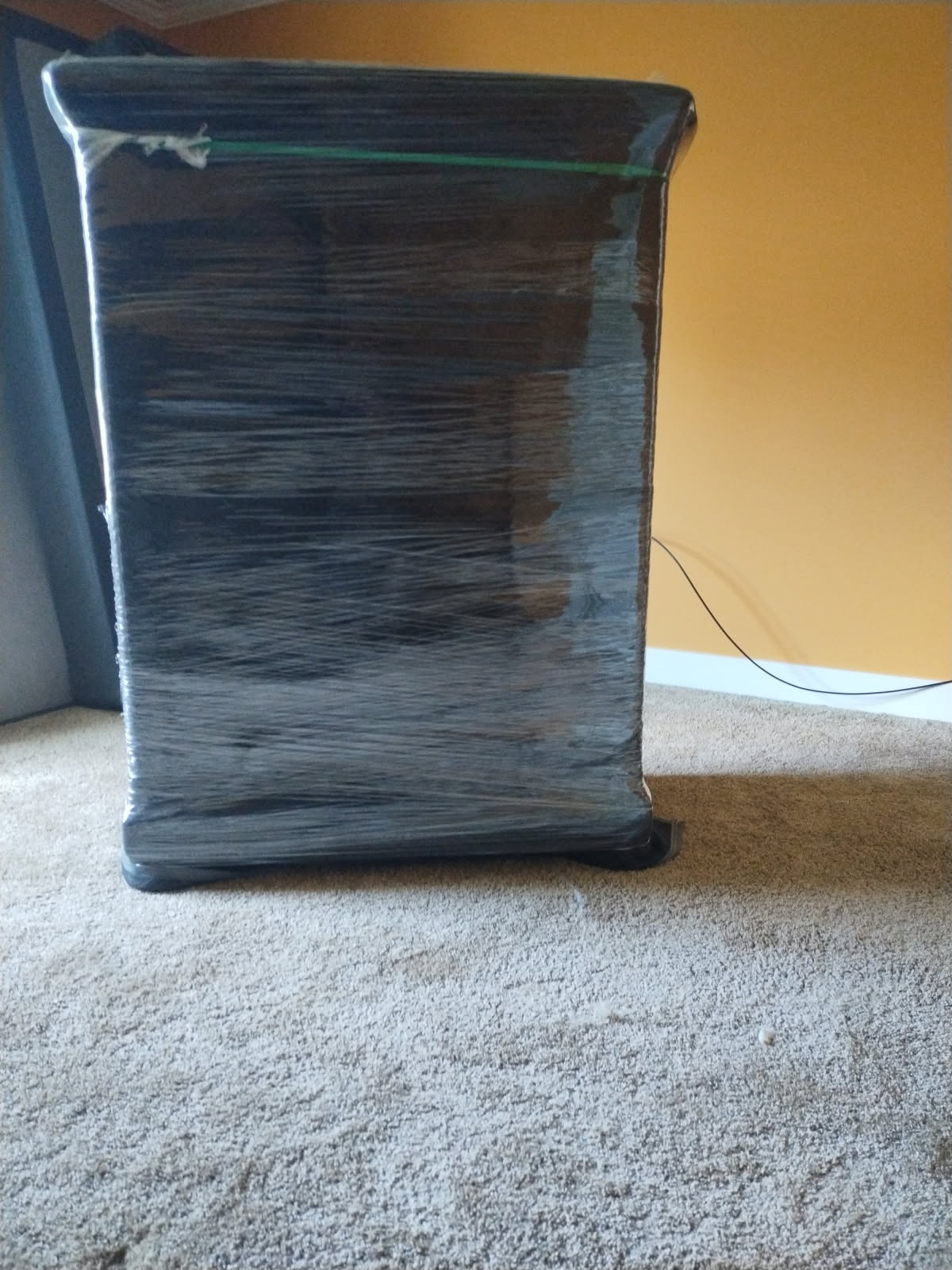 Furniture item wrapped and protected for the move