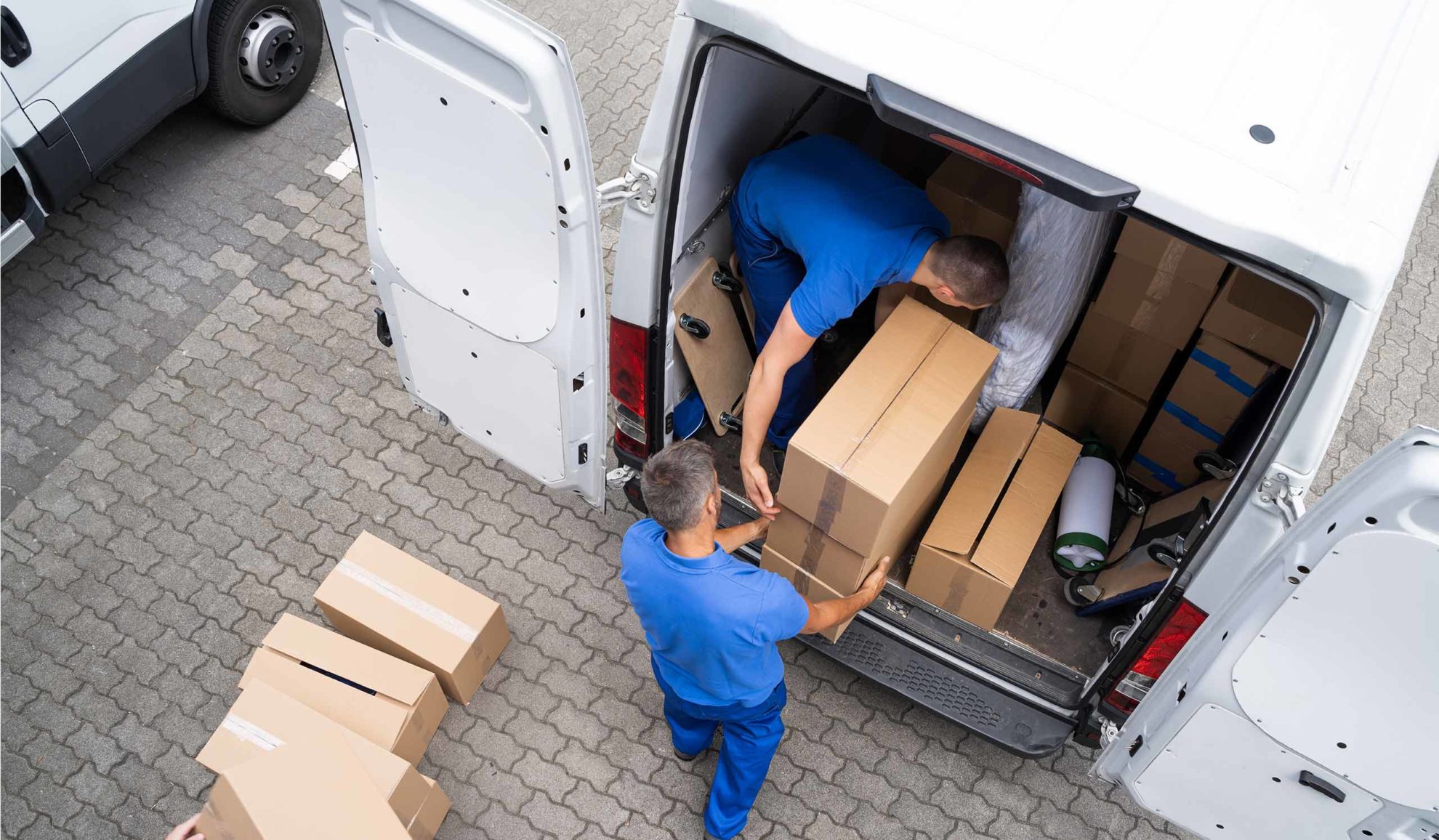 movers-loading-moving-boxes-to-a-truck-for-transportation-lansing-mi