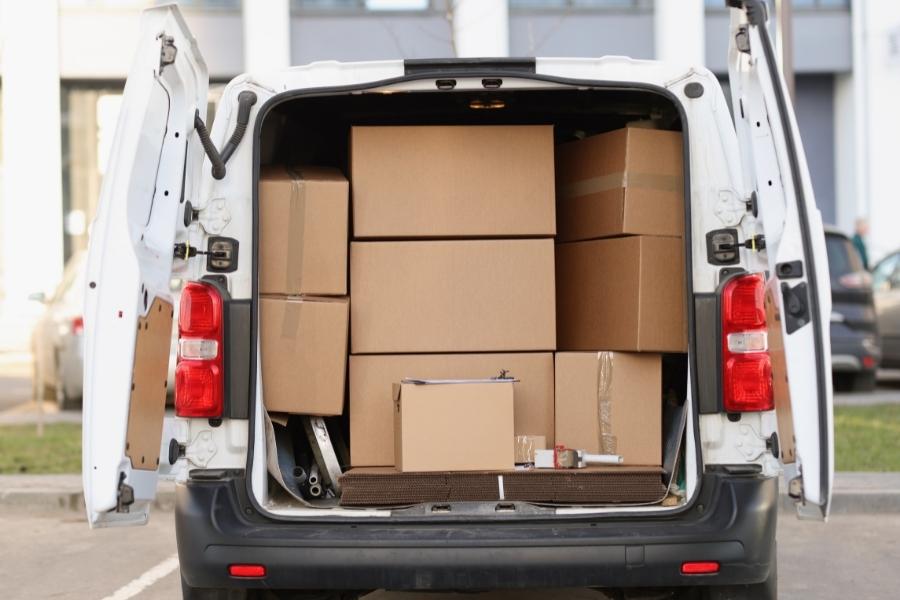 moving-truck-back-with-cardboard-boxes-inside-shaftsburg-mi